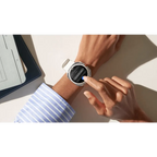 Galaxy Watch Ultra on wrist with finger touching screen showcasing its sleek design